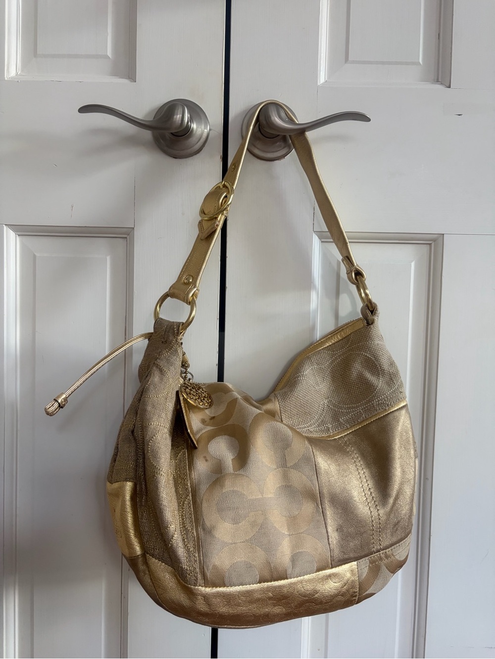 Coach Gold Metallic Signature Hobo